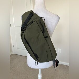 NWT Apaka The Metro Sling Bag in Olive Green